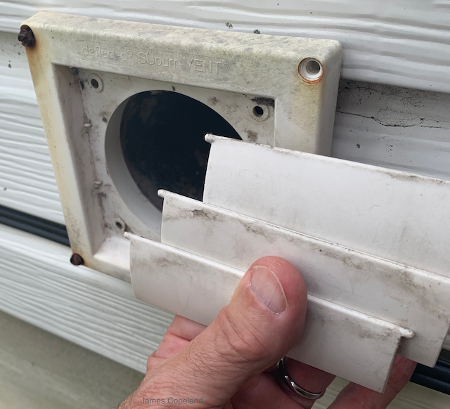 Exterior clothes dryer exhaust vent with its cover removed